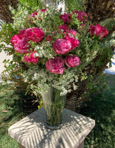 exotic purple pink and white roses flowers and eucalyptus. Floral designs and flower arrangement by Bloom Parlor located in Mission Viejo, California.