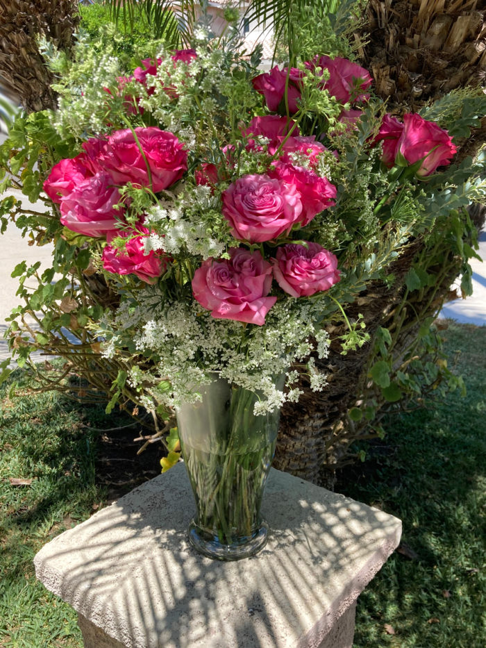 exotic purple pink and white roses flowers and eucalyptus. Floral designs and flower arrangement by Bloom Parlor located in Mission Viejo, California.