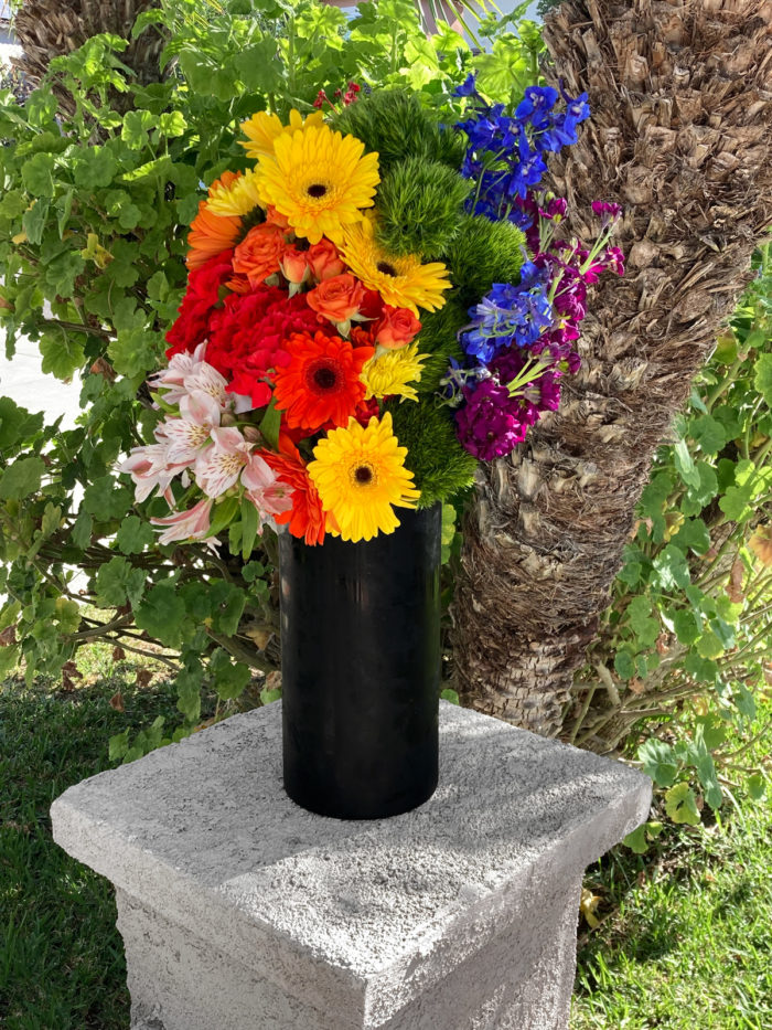 Rainbow LGBTQ pride flowers and roses. A custom Bloom Parlor floral arrangement and design.